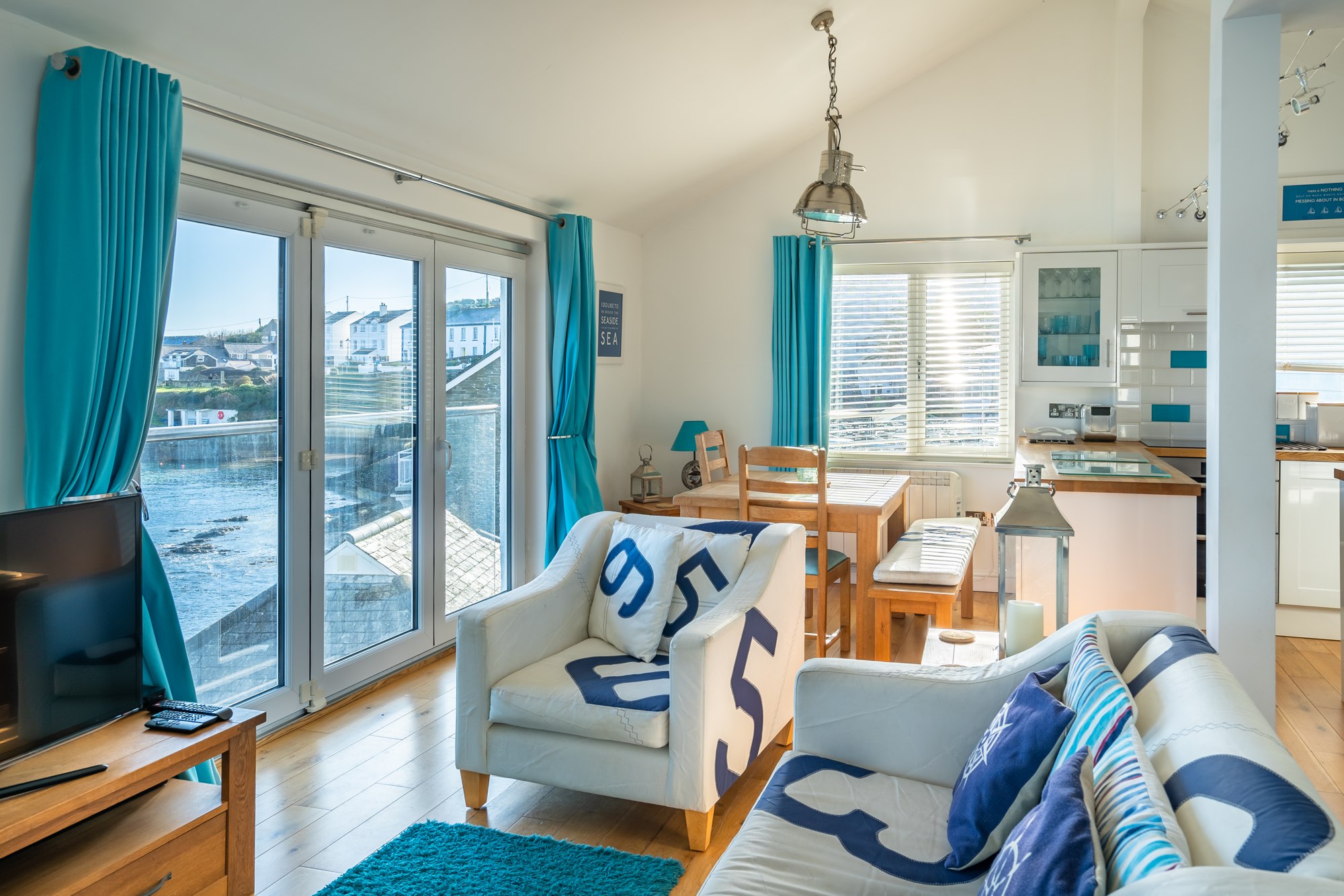 Top Deck's open living and dining room, with wide sea views