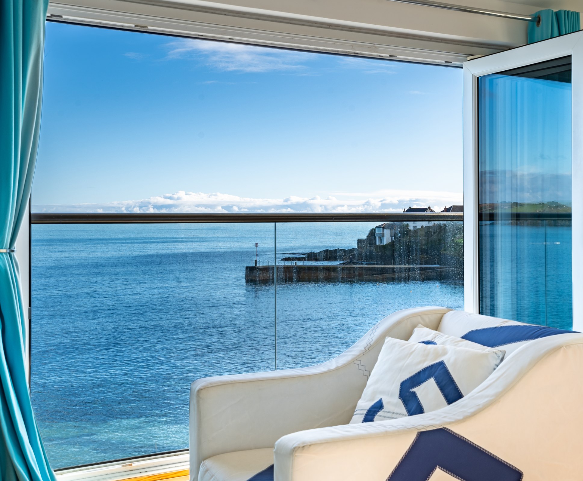 Open doors at Top Deck looking directly across the sea to Portscatho harbour